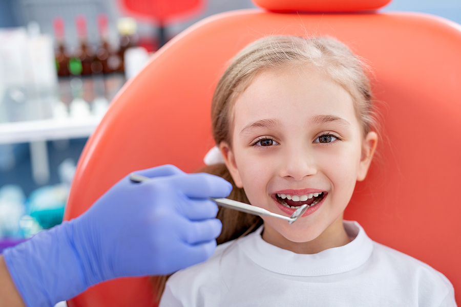 Why A Kid’s Tooth Extraction May Be Necessary